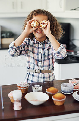 Buy stock photo Shot of a playful little girl having fun while baking in the kitchen at home