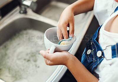 Buy stock photo Girl, hands and learning to wash dishes in kitchen, sanitary and prevent bacteria or germs. Female person, child and soap for cleaning mess in home, housework and kid helping for responsibility