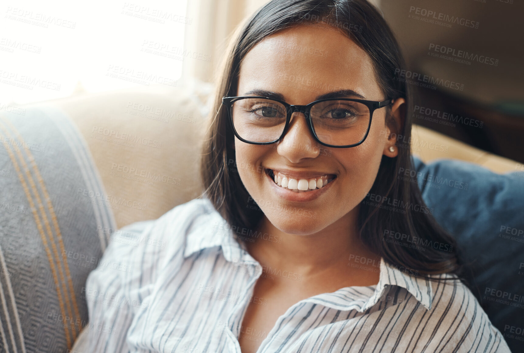 Buy stock photo Smile, woman and portrait with glasses for relax on sofa, living room and weekend for rest. Face, prescriptions or couch for calm on holiday for female person, home and happy in Los Angeles for break