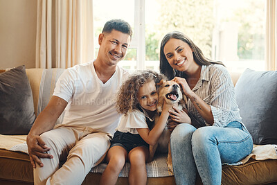 Buy stock photo Mother, father and girl with dog for portrait on sofa for love, bonding and affection with safety or animal. Mom, dad and kid with family pet in home with care, together and relax with happiness.