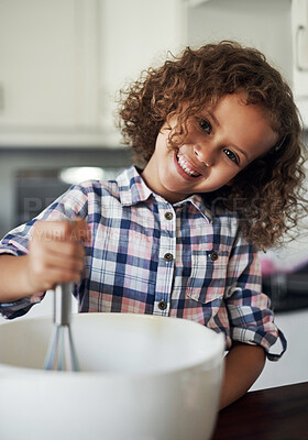 Buy stock photo Portrait of a playful little girl having fun while baking in the kitchen at home