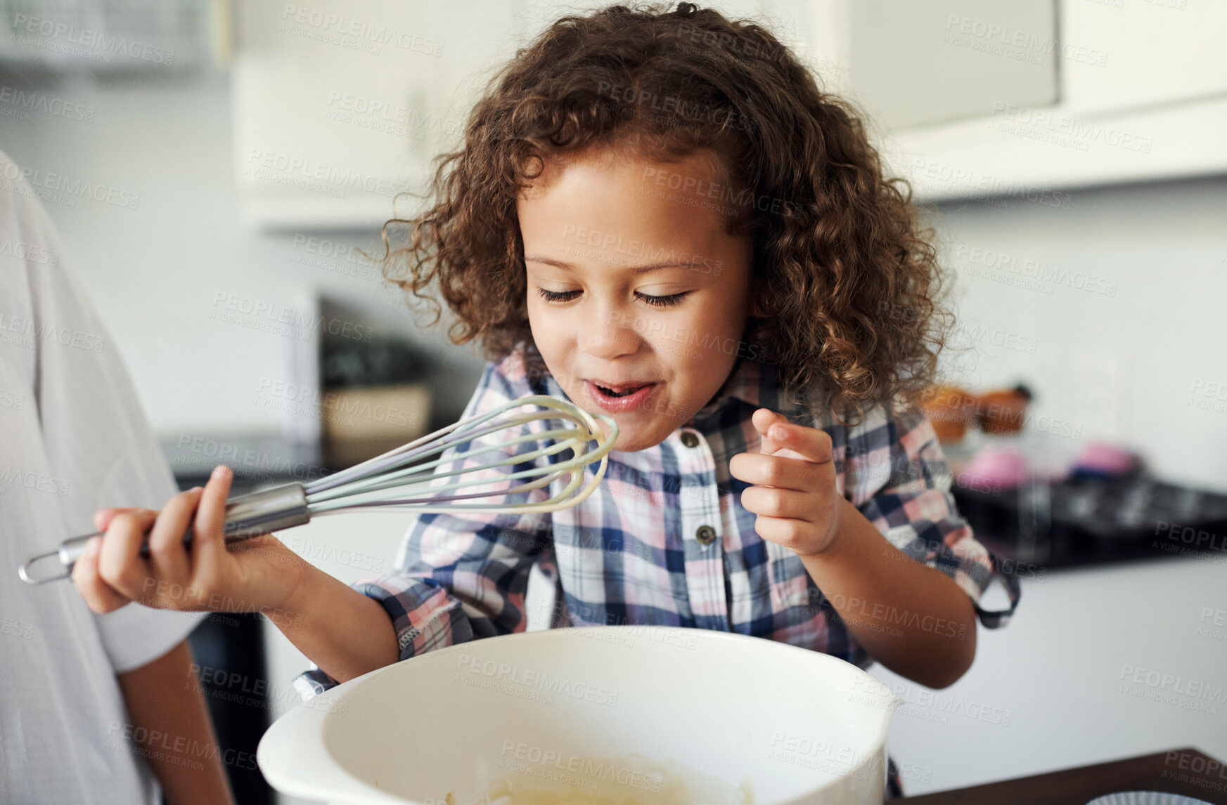 Buy stock photo Child, taste and girl in kitchen for baking, recipe and ingredients for skills development with learning. Family home, counter and kid with dessert, pastry and breakfast preparation in bowl as baker