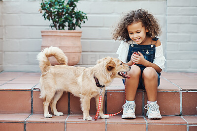 Buy stock photo Full length shot of an adorable young girl sitting outside and bonding with her dog