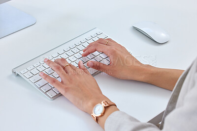 Buy stock photo Closeup shot of an unrecognisable businesswoman working on a computer in an office