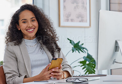 Buy stock photo Portrait of a young businesswoman using a cellphone in an office