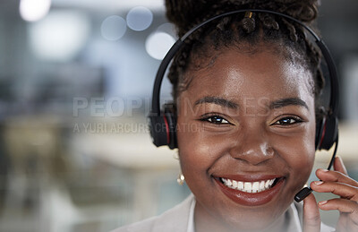 Buy stock photo Shot of a young female call center agent working in an office