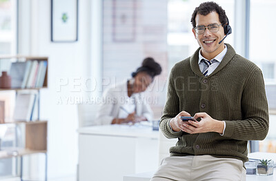 Buy stock photo Portrait, man and happy with smartphone at call center for customer or client support and service. Office, crm and advisor or consultant with smile or satisfied with job and career growth as agent