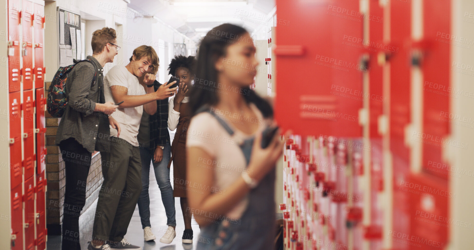 Buy stock photo Bully, students and girl in high school, anxiety and stress with depression, sad and social issue. Female person, young people and teenager with mental health, locker and harassment with gossip