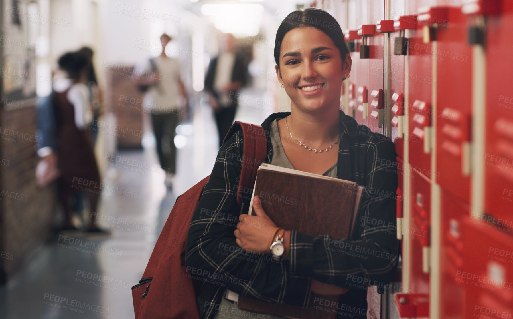 Buy stock photo Portrait, education and notebook break with a girl by her locker in the hallway of her school. Learning, university or scholarship with a college pupil holding research books for studying knowledge