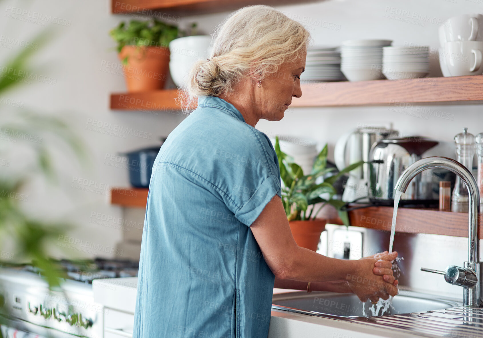 Buy stock photo Woman, sink and kitchen for hands for washing, hygiene and water for clean in home. Sanitation, disinfection and safety from germs and virus for mature person, wellness and cleaning of bacteria