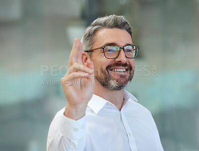 Buy stock photo Shot of a handsome businessman with his hand raised in question
