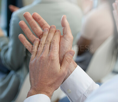 Buy stock photo Shot of a businessman giving a round of applause during a meeting