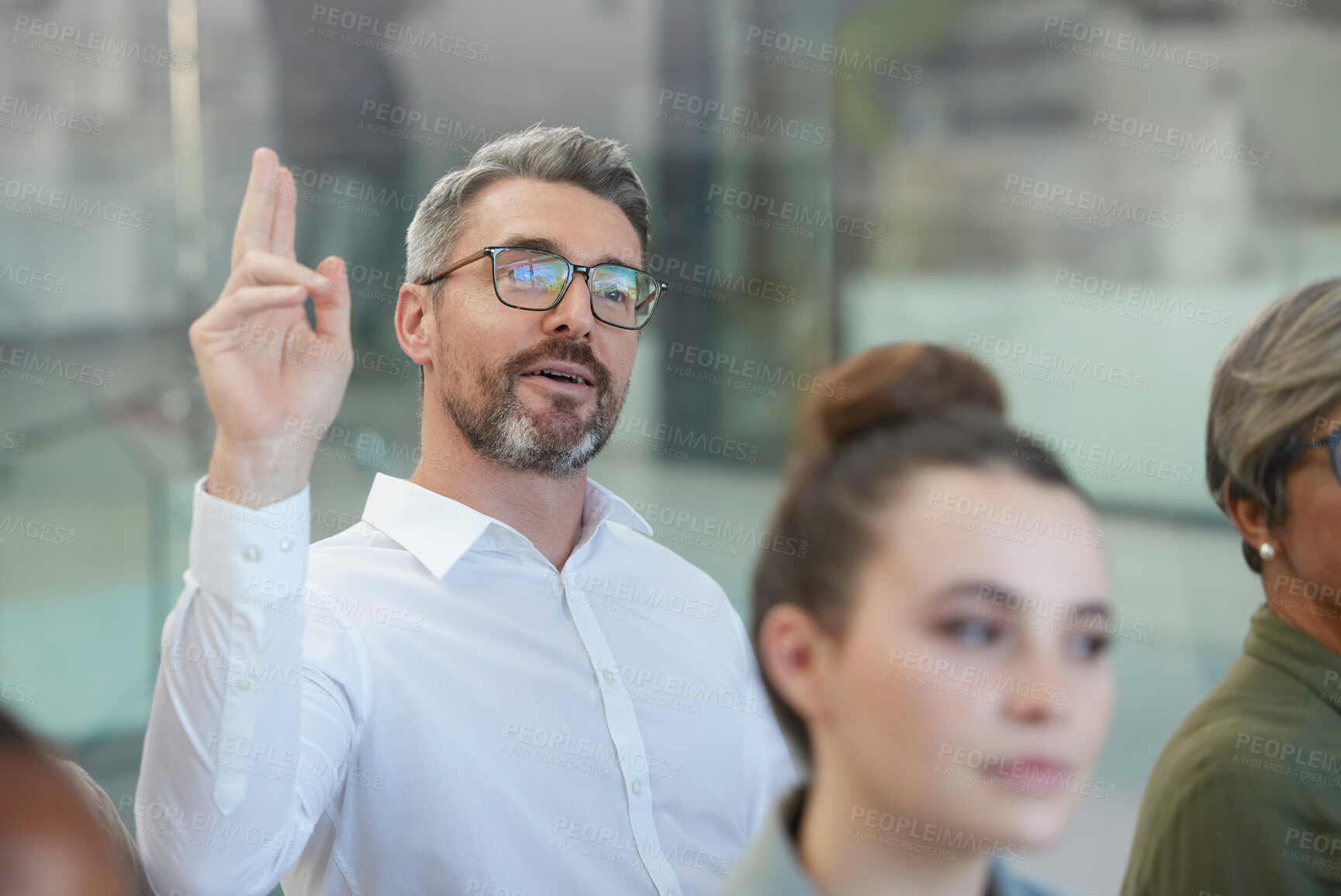 Buy stock photo Audience, business and man with question at conference for feedback, brainstorming or employee engagement. Planning, team building or about us at workshop for ideas, growth or development in training