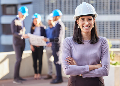 Buy stock photo Happy woman, portrait and architect with arms crossed for construction in team management or leadership on site. Confident female person, engineer or manager with hard hat for industrial architecture