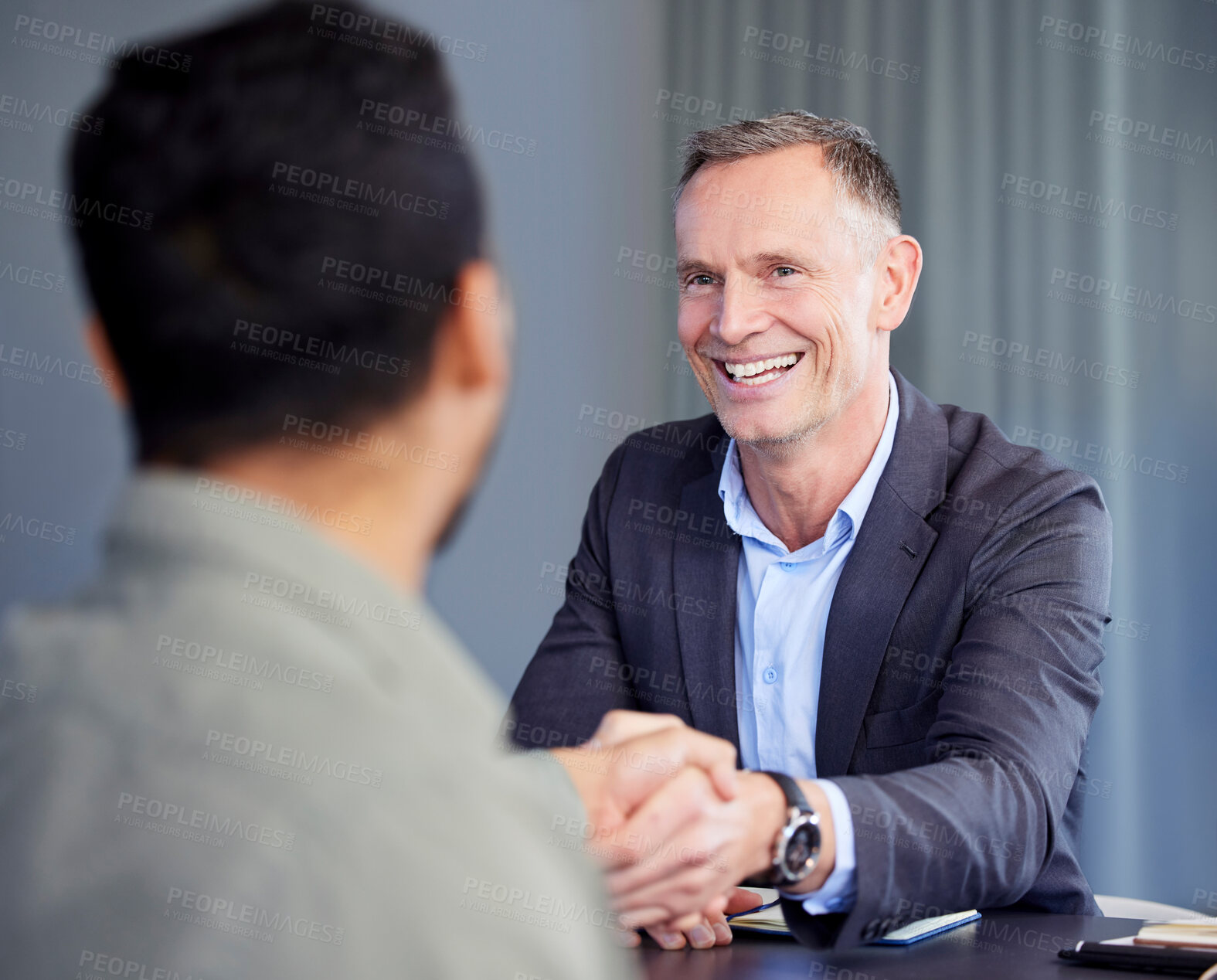 Buy stock photo Smile, handshake and business people in office for deal, agreement or b2b partnership discussion. Happy, team and professional men lawyers shaking hands for contract merger, onboarding or recruitment