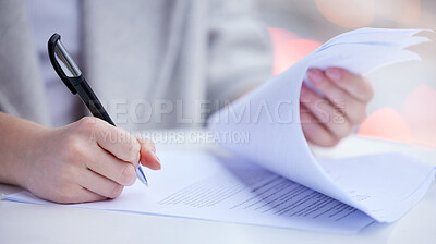 Buy stock photo Shot of an unrecognizable businessperson going through paperwork at work