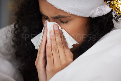 Buy stock photo Woman, blanket and sick with tissue on Christmas or blowing nose in home, holiday or symptoms. Female person, hat and flu allergies or virus for festive season with cold weather, fever or vacation