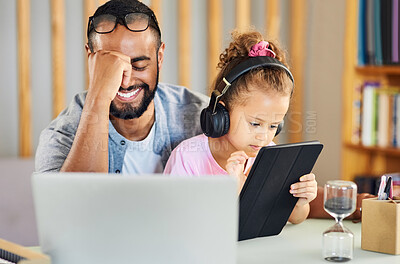 Buy stock photo Shot of a young father showing his daughter his work