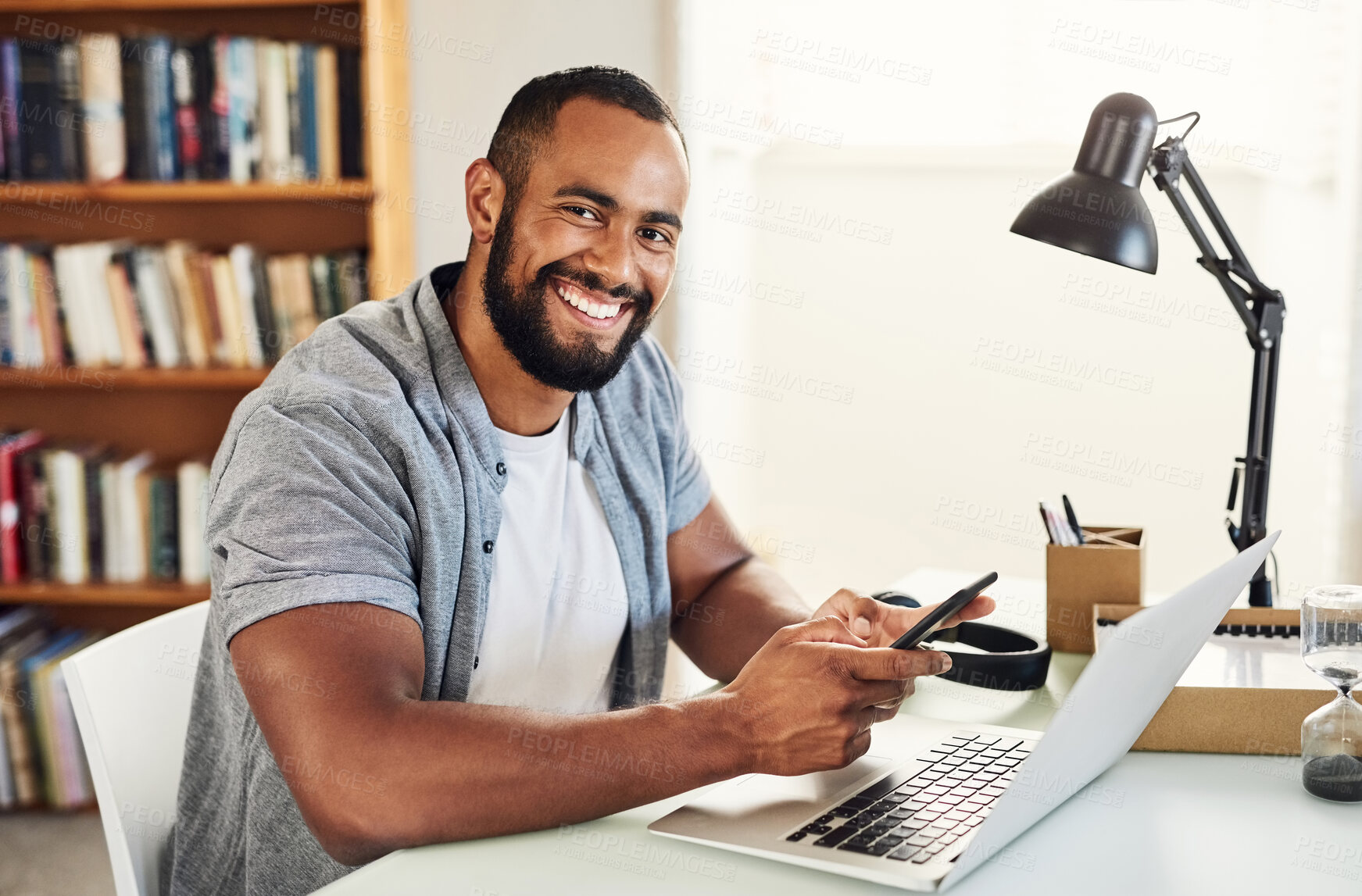 Buy stock photo Shot of a businessman using his smartphone to send a text message