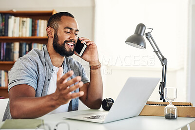 Buy stock photo Shot of a handsome businessman using his smartphone to make a phonecall while working from home