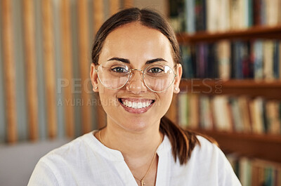 Buy stock photo Shot of a beautiful young woman working from home