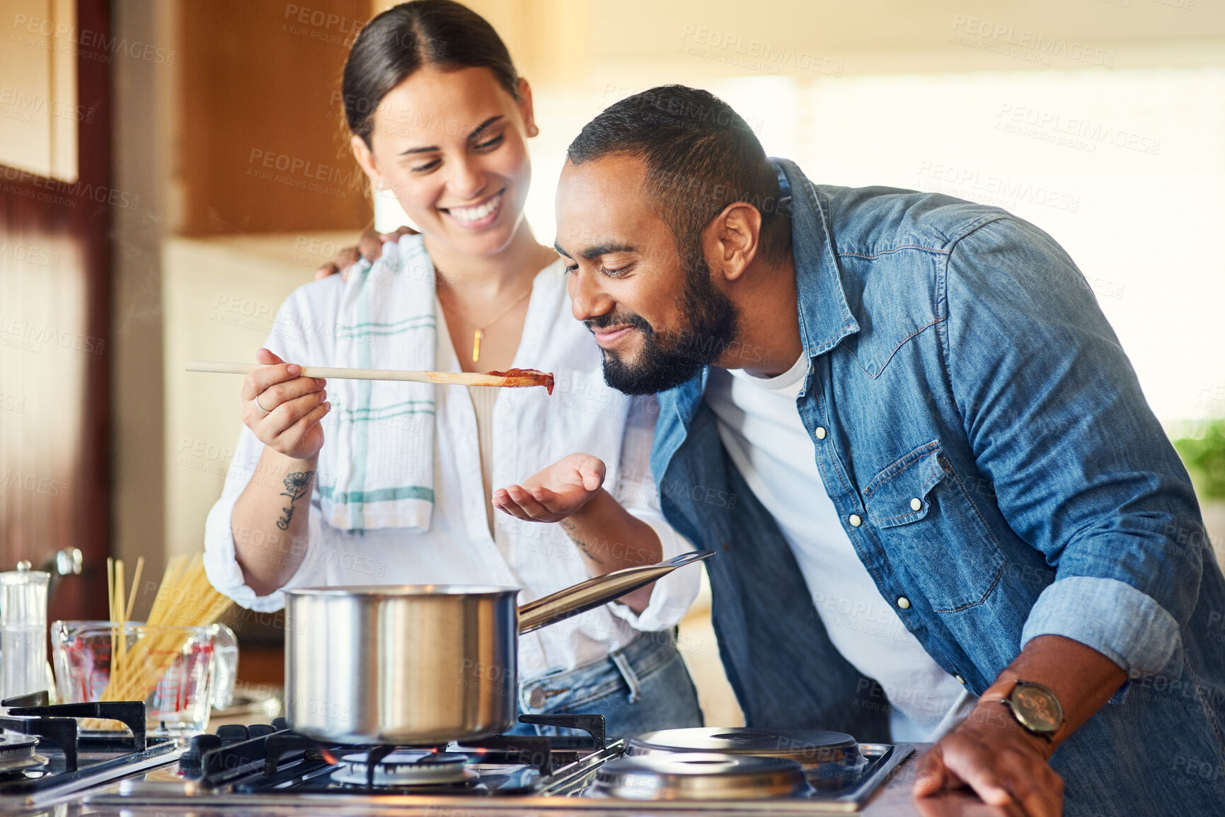 Buy stock photo Shot of a couple cooking together at home