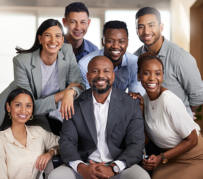 Buy stock photo Cropped portrait of a diverse group of businesspeople posing in their office