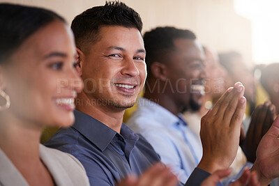 Buy stock photo Cropped portrait of a handsome mature businessman applauding while sitting with his colleagues in the boardroom during a presentation
