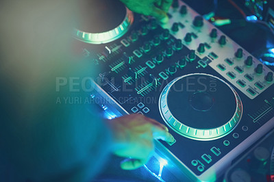 Buy stock photo Shot of an unidentifiable DJ making music in a nightclub