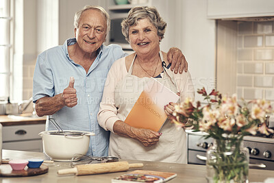 Buy stock photo Shot of a senior couple baking together at home