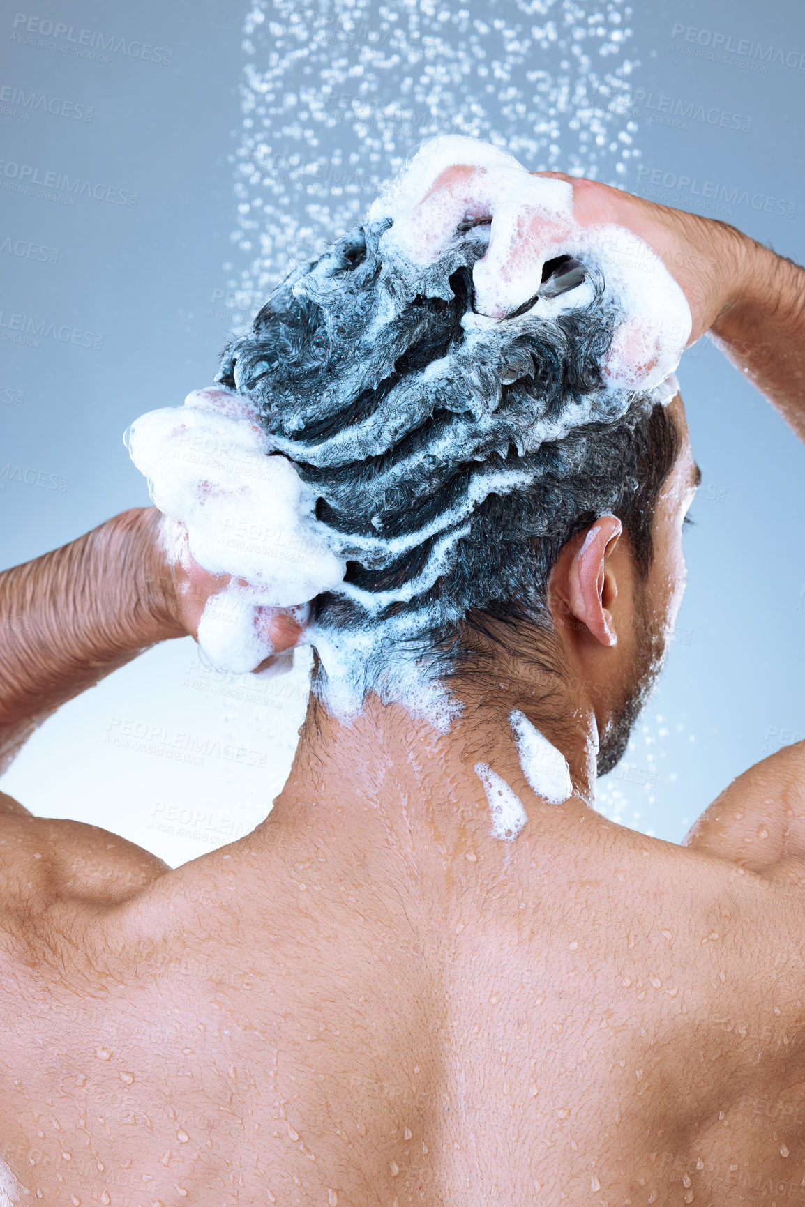 Buy stock photo Shower, washing hair and man on studio background with shampoo for hygiene, grooming or morning routine. Back view, body and model with foam for natural treatment, soap or cleaning in bathroom