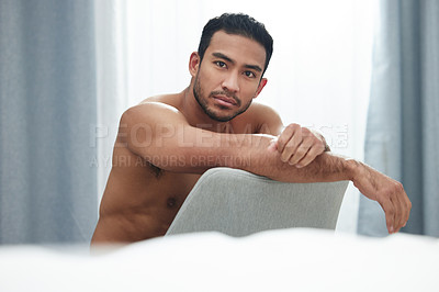 Buy stock photo Nude man, portrait and body on chair with sensual, topless and seductive as hot or alluring in bedroom. Male person, naked and bare for sexy, confidence and masculine with undressed, toned and home