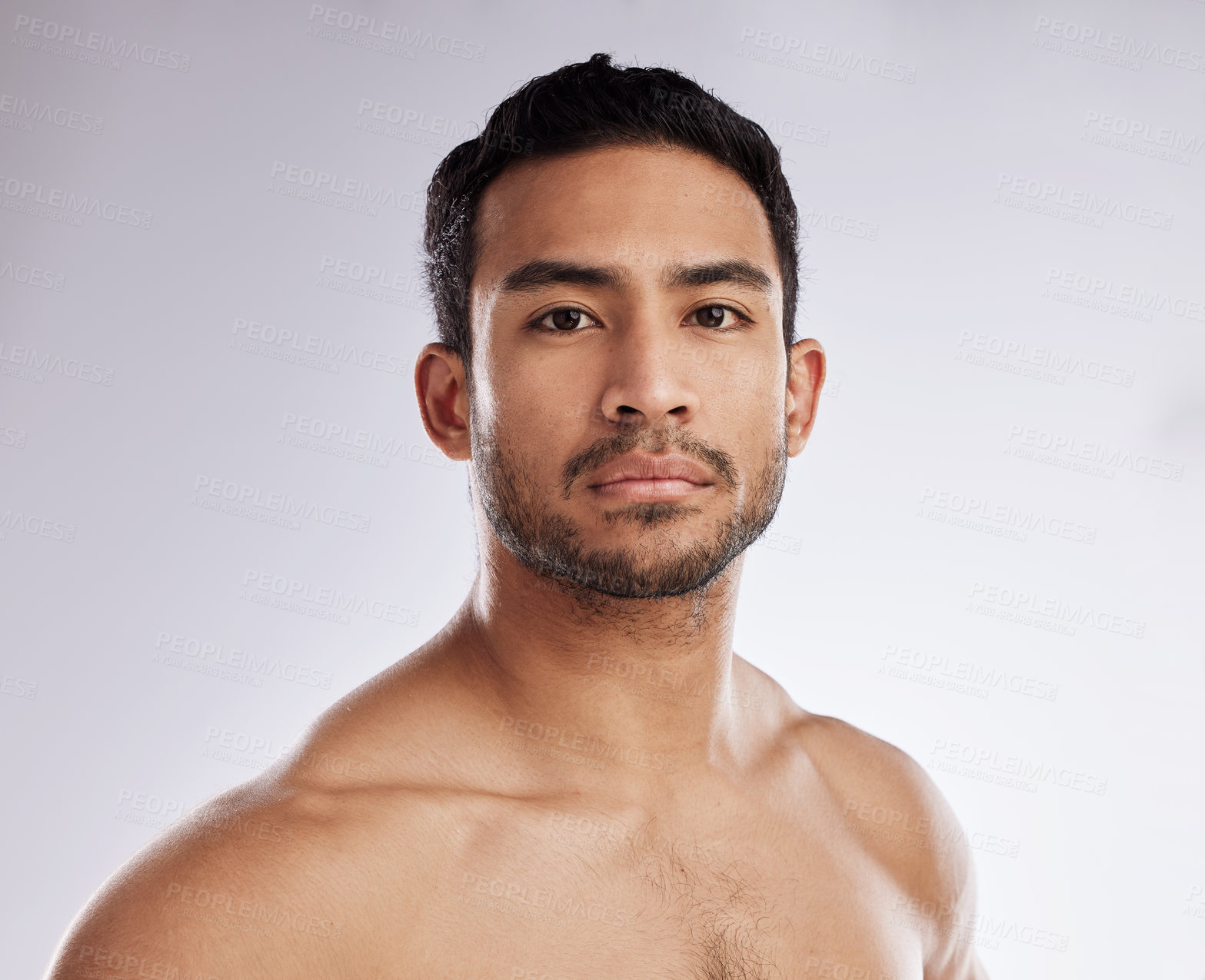 Buy stock photo Confidence, portrait and young man in a studio after a workout or body strength training. Serious, sports and face of attractive male model with muscles after exercise isolated by a white background.