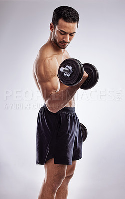 Buy stock photo Man, dumbbell and body in studio for workout, muscle and fitness on white background with bicep. Athlete, gym and training for sports, exercise and wellness as bodybuilder with weights or power