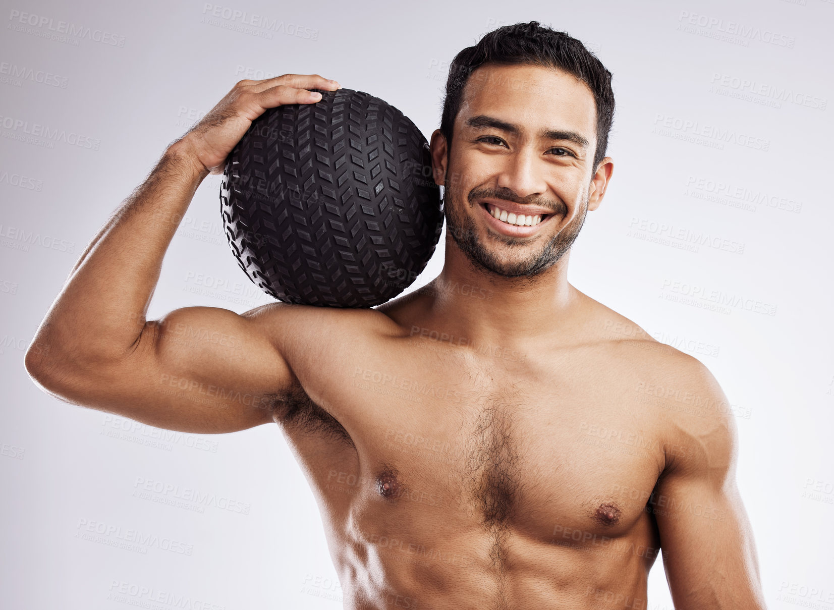 Buy stock photo Portrait, fitness and happy man with medicine ball in studio for body care, wellness and health for muscles. Male person, bodybuilder and workout or training for weight loss by white background