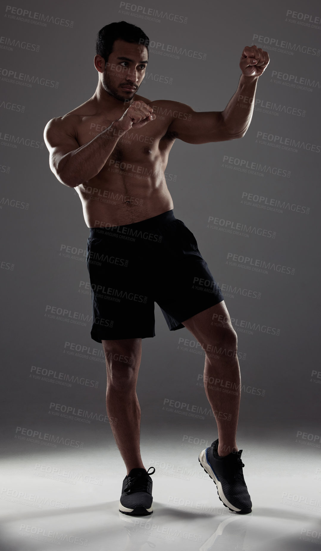 Buy stock photo Man, boxer and punch in studio for fitness for mma sport, fighter and background or training for challenge or competition fight. Strong, power and exercise for strength, combat workout and health