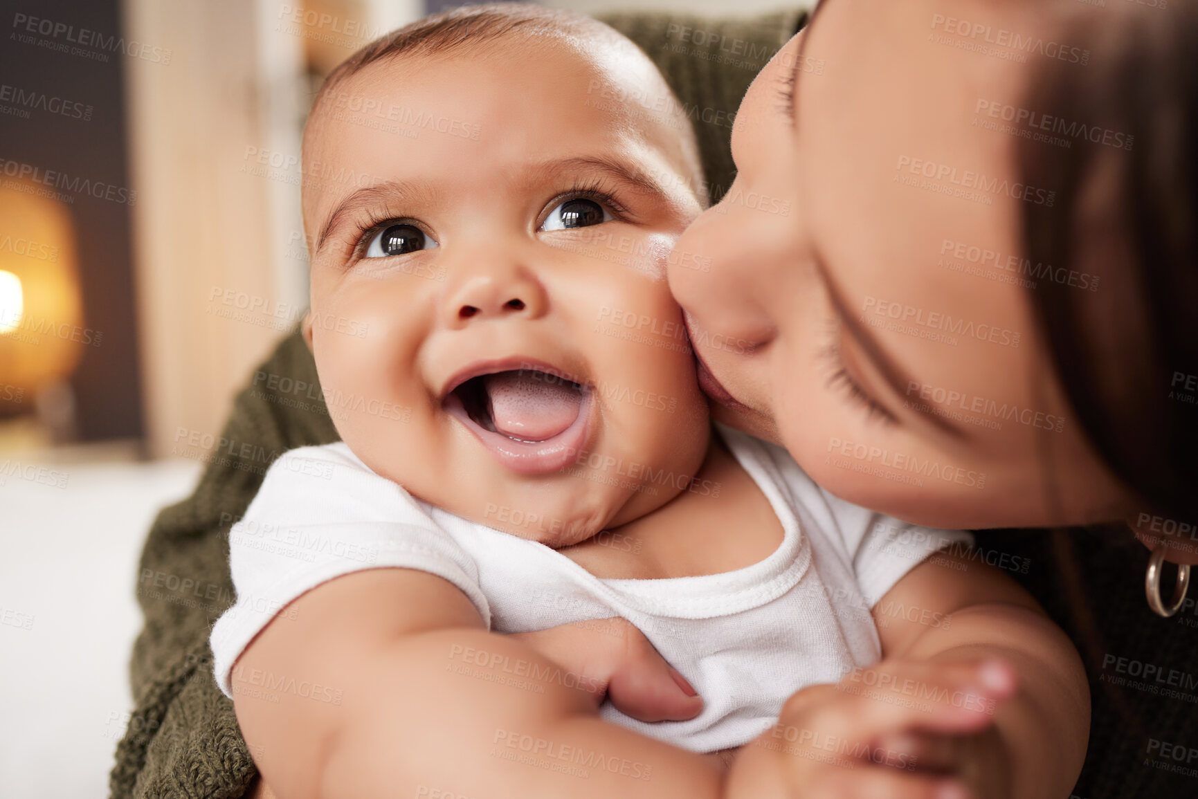 Buy stock photo Love, mother and kissing baby in home with bonding, connection and playing together. Parenting, woman and infant with protection, support and cuddle for child development, growth and care in bedroom