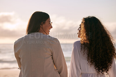 Buy stock photo Shot of two best friends bonding during a day out on the beach