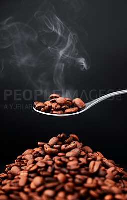 Buy stock photo Studio, coffee beans and scent or aroma on spoon for organic diet, roast and black background. Art, seeds and texture of raw ingredient for espresso or flavor, cappuccino and steam on mockup space