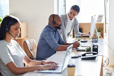 Buy stock photo Call center, crm or support with a manager and consultant at work in an office for assistance. Contact us, customer service or consulting with hr management training an employee in telemarketing