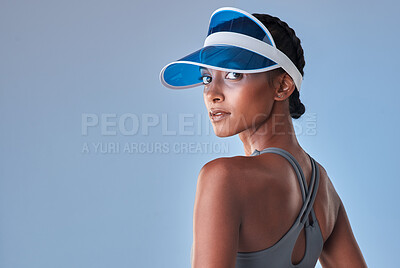 Buy stock photo Studio shot of a fit young woman posing against a grey background