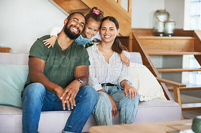 Buy stock photo Portrait of a happy family relaxing together at home