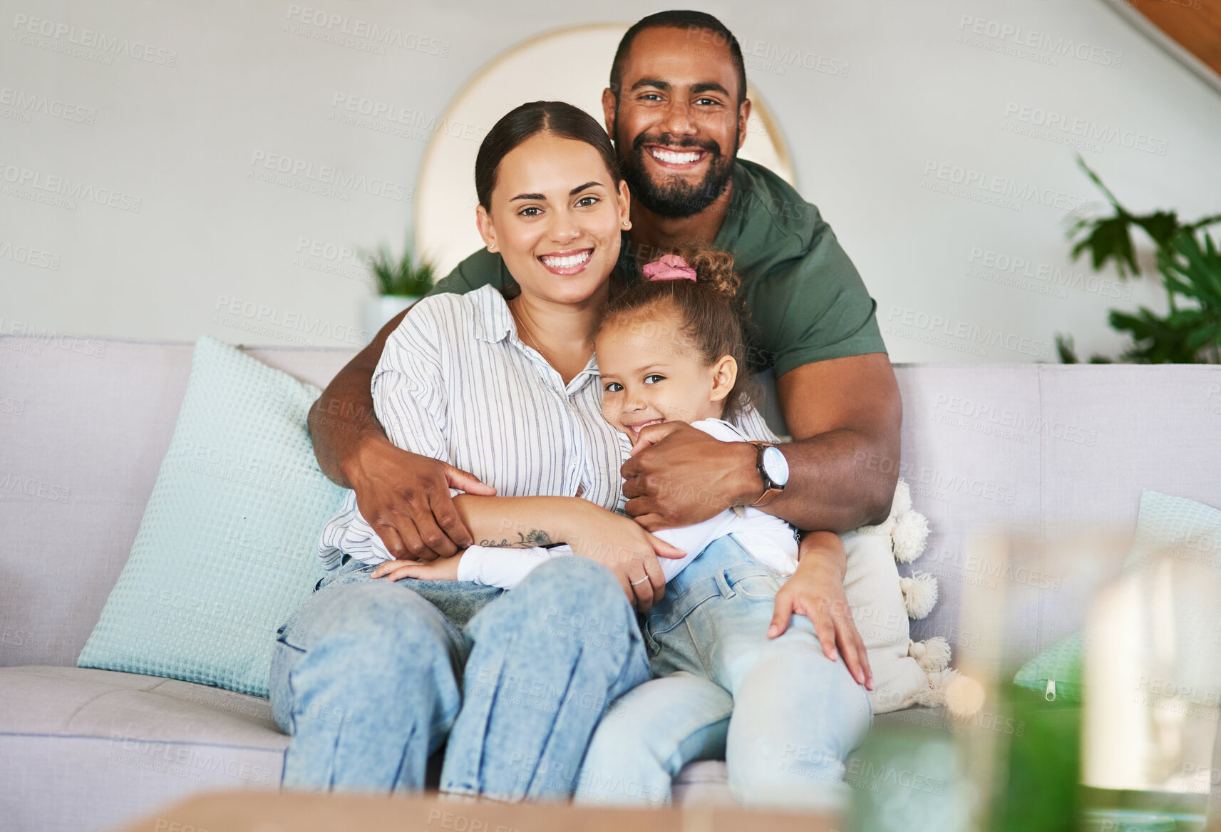 Buy stock photo Portrait of a happy family relaxing together at home