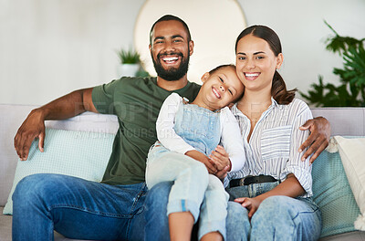 Buy stock photo Portrait of a happy family relaxing together at home