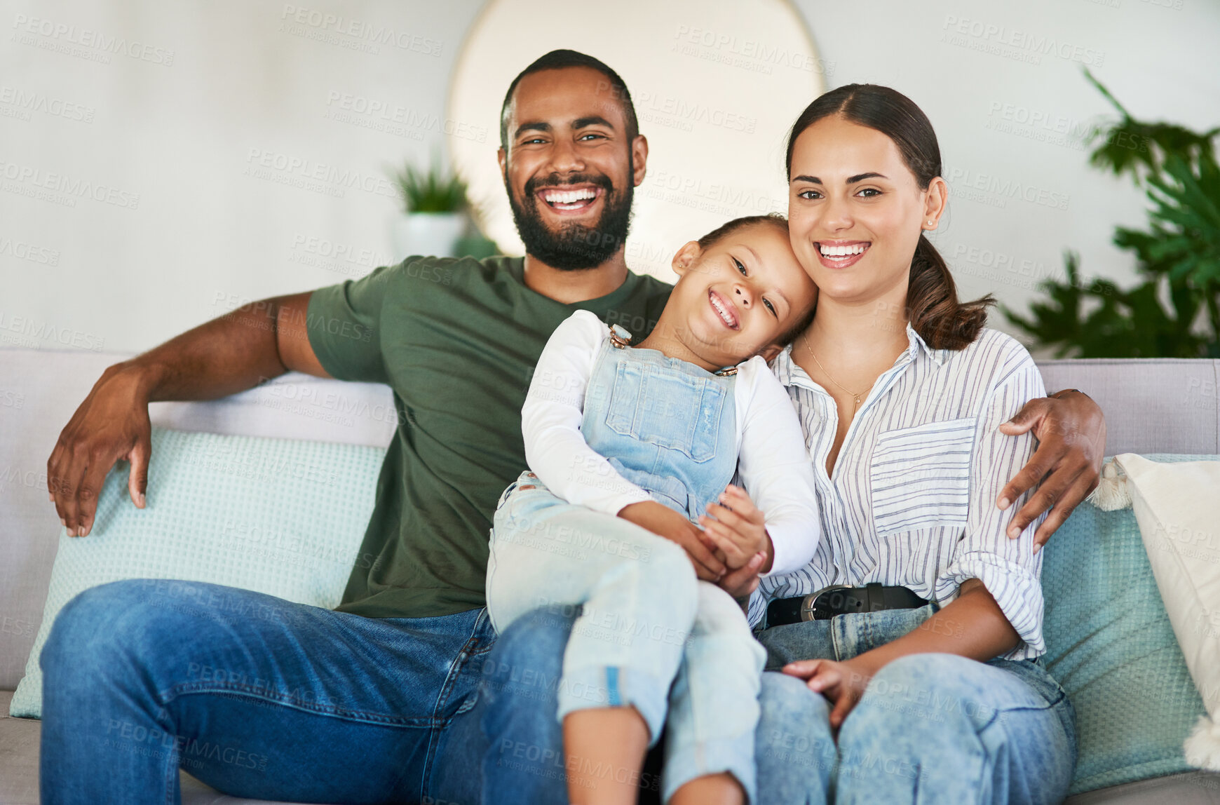 Buy stock photo Portrait of a happy family relaxing together at home