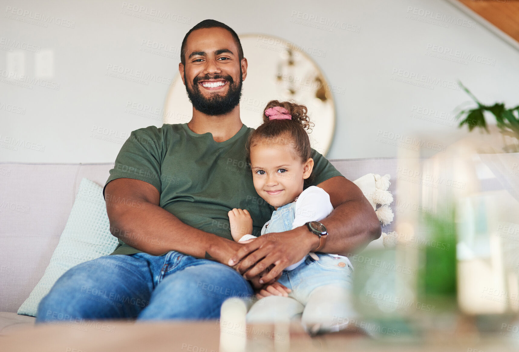 Buy stock photo Portrait of a father and his little daughter relaxing together at home