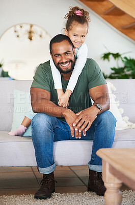 Buy stock photo Portrait of a father and his little daughter relaxing together at home