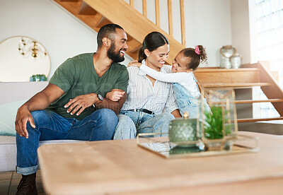 Buy stock photo Shot of a happy family relaxing together at home