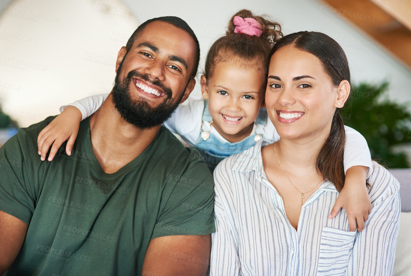 Buy stock photo Portrait of a happy family relaxing together at home