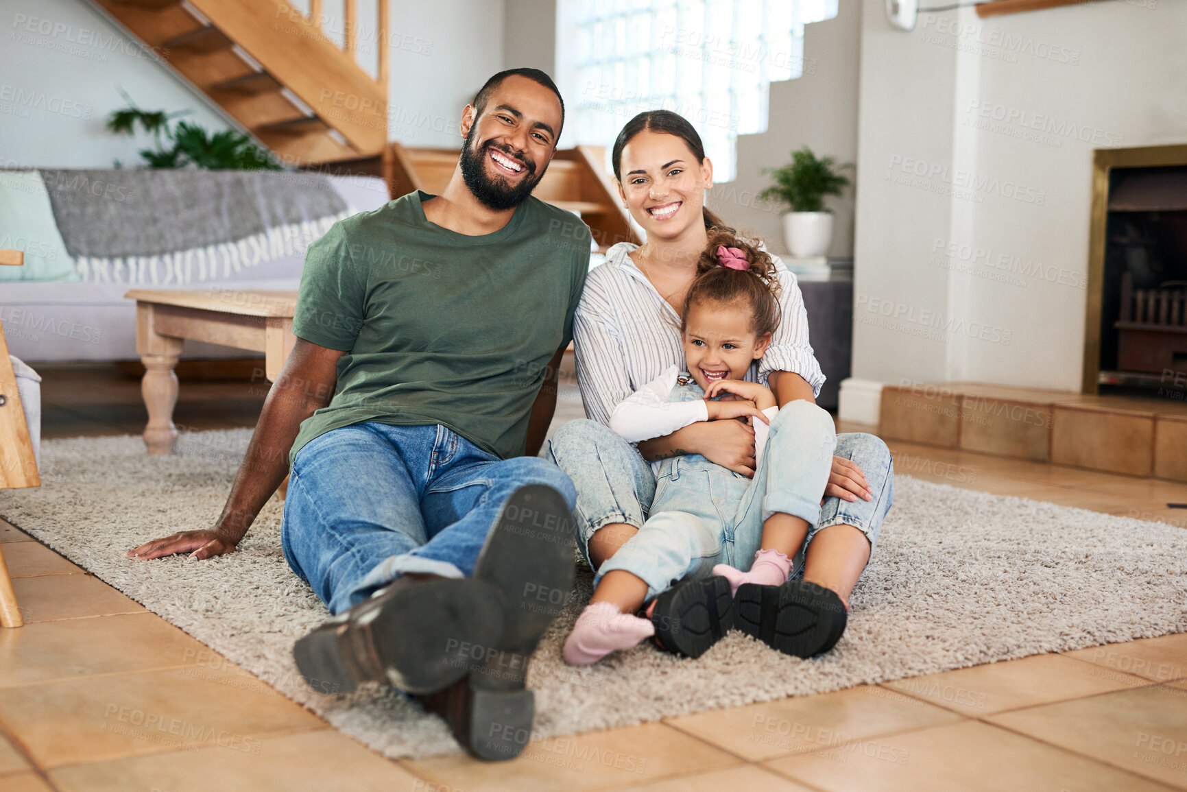 Buy stock photo Portrait of a happy family relaxing together at home